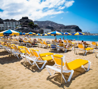 Public beach of Puerto Rico , Gran Canaria. Spain. PUERTO RICO, GRAN CANARIA, SPAIN_MAY 20, 2016: Public beach of Puerto Rico on May 20, 2016 at Gran Canaria. Spain.